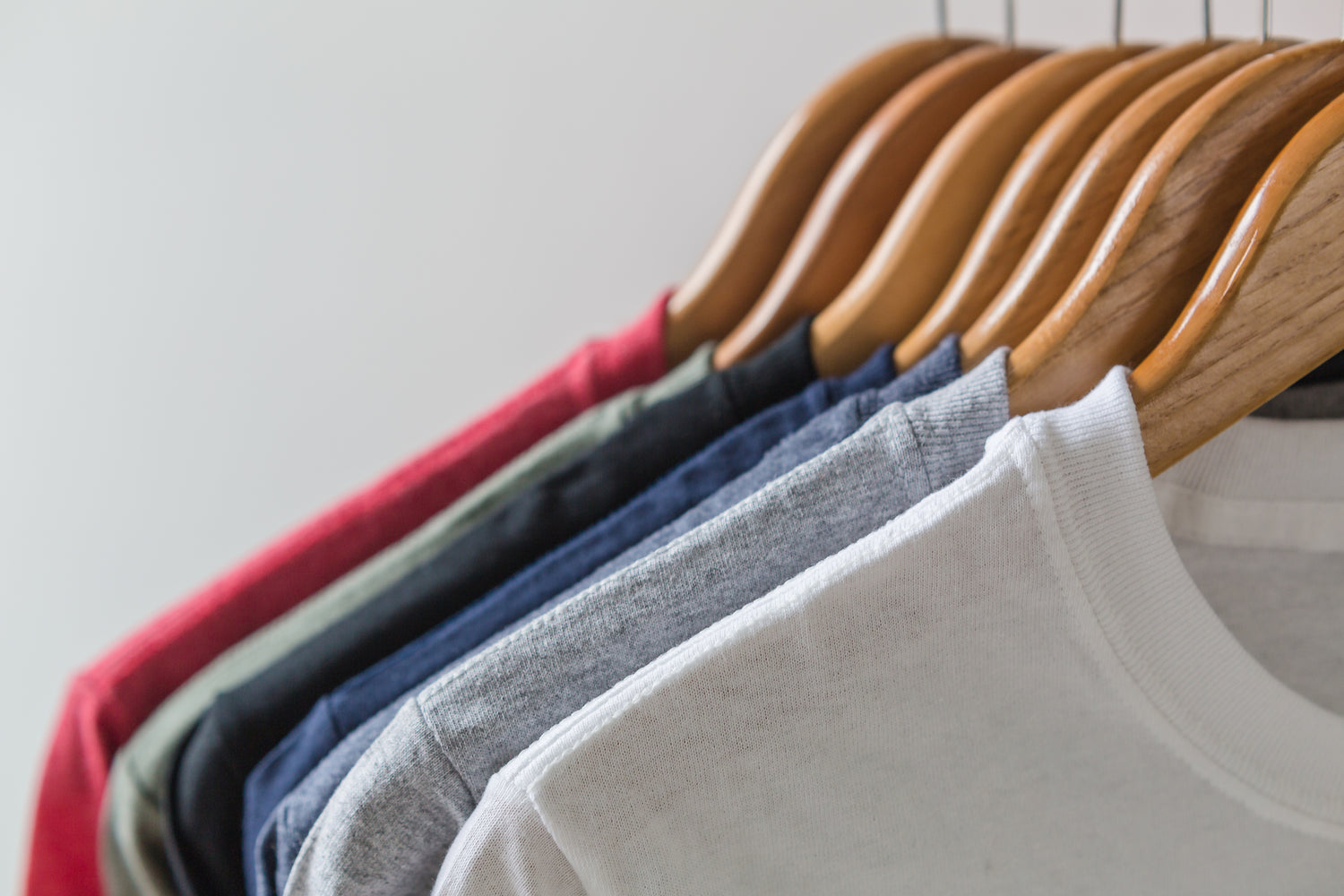 Row of shirts on hangers